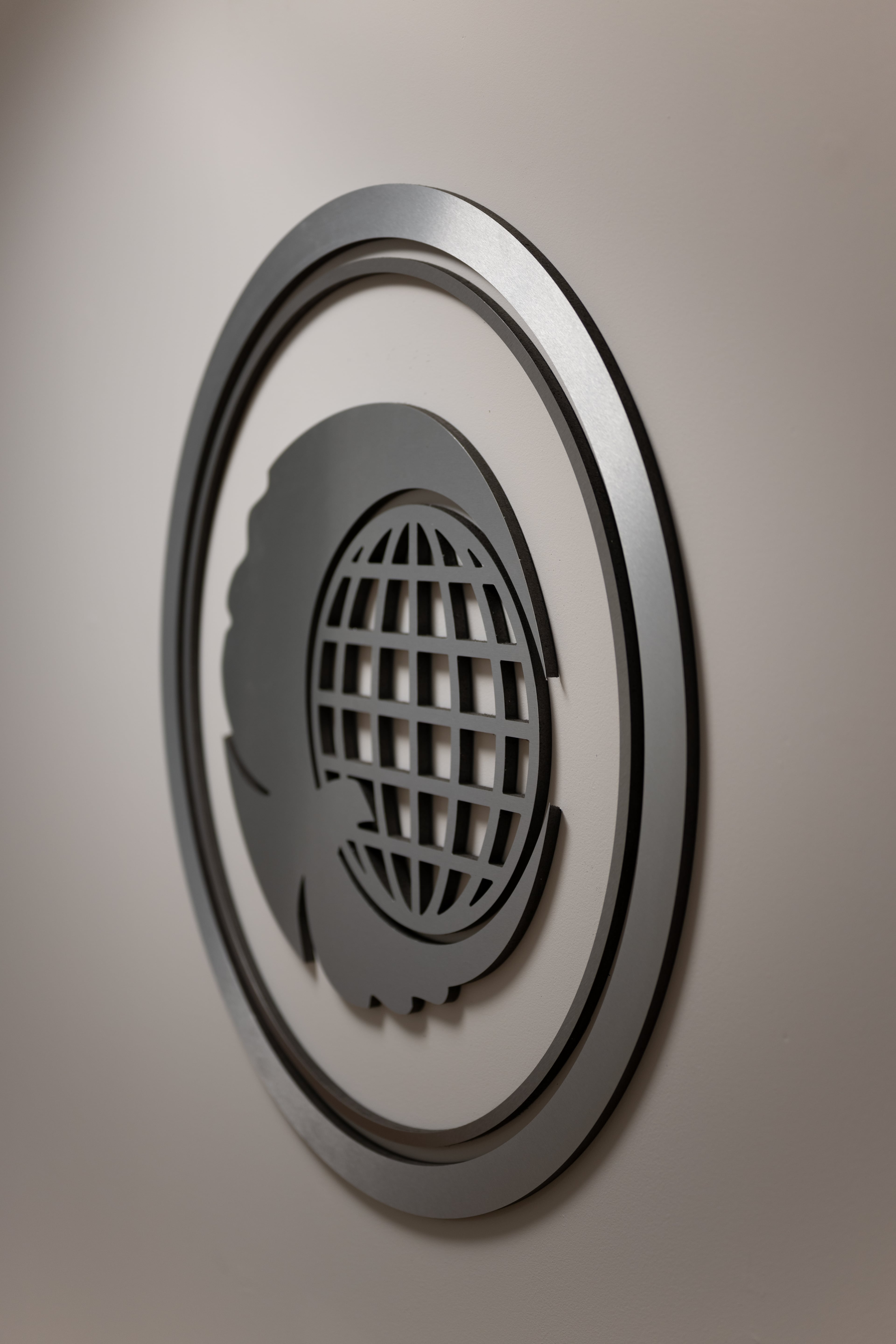 The F3 International Resources seal mounted at the company's offices